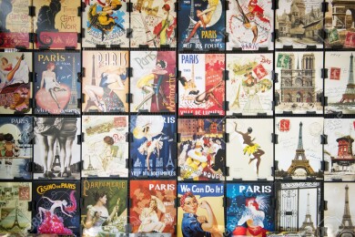 Paris, France - June 20, 2014: Collections of vintage postcards of burlesque dancer, the famous poster of Le Chat Noir, and other pictures from Paris. Le Chat Noir was a 19th century cabaret club in Montmartre.